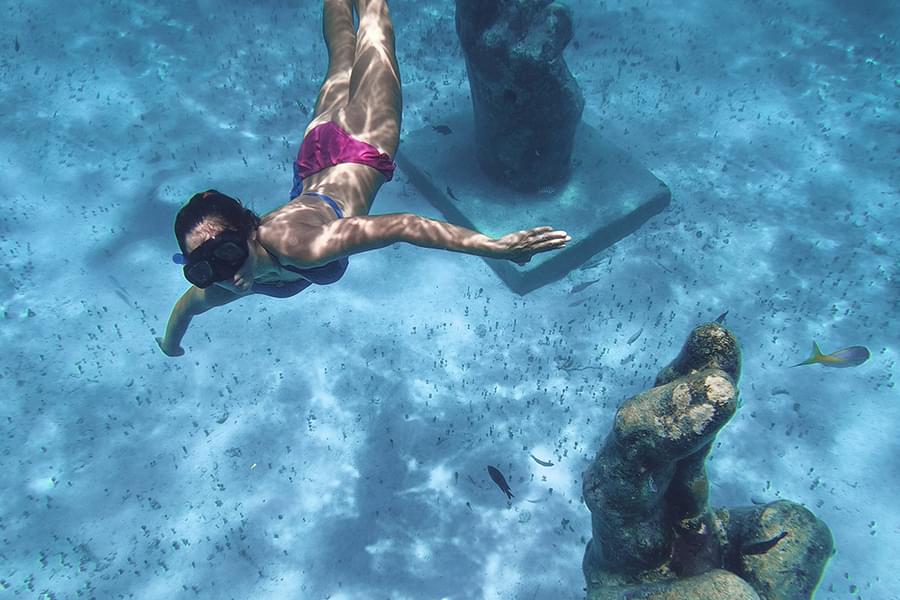woman snorkeling in Cancun